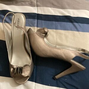 Hardly worn pewter colored heels with toe accents